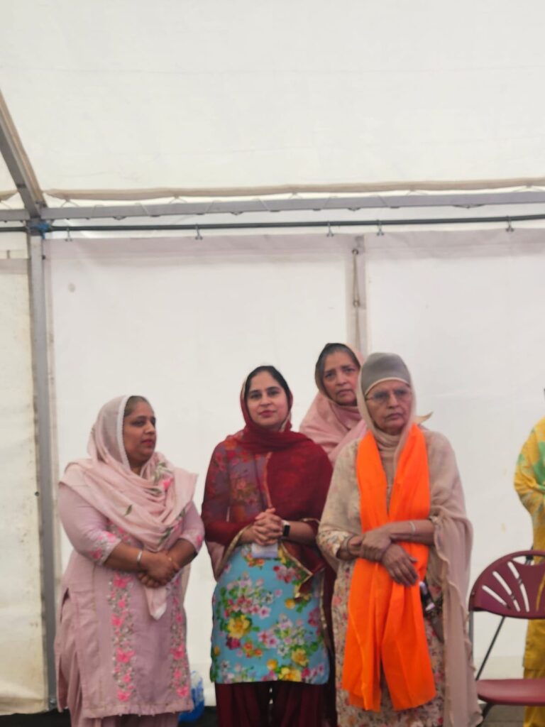 Bibi Charanjit Kaur honoured with a siropa at Guru Nanak Gurdwara Smethwick