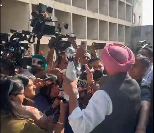 Ravneet Bittu arrived outside the Legislative Assembly carrying a bottle with a bell attached